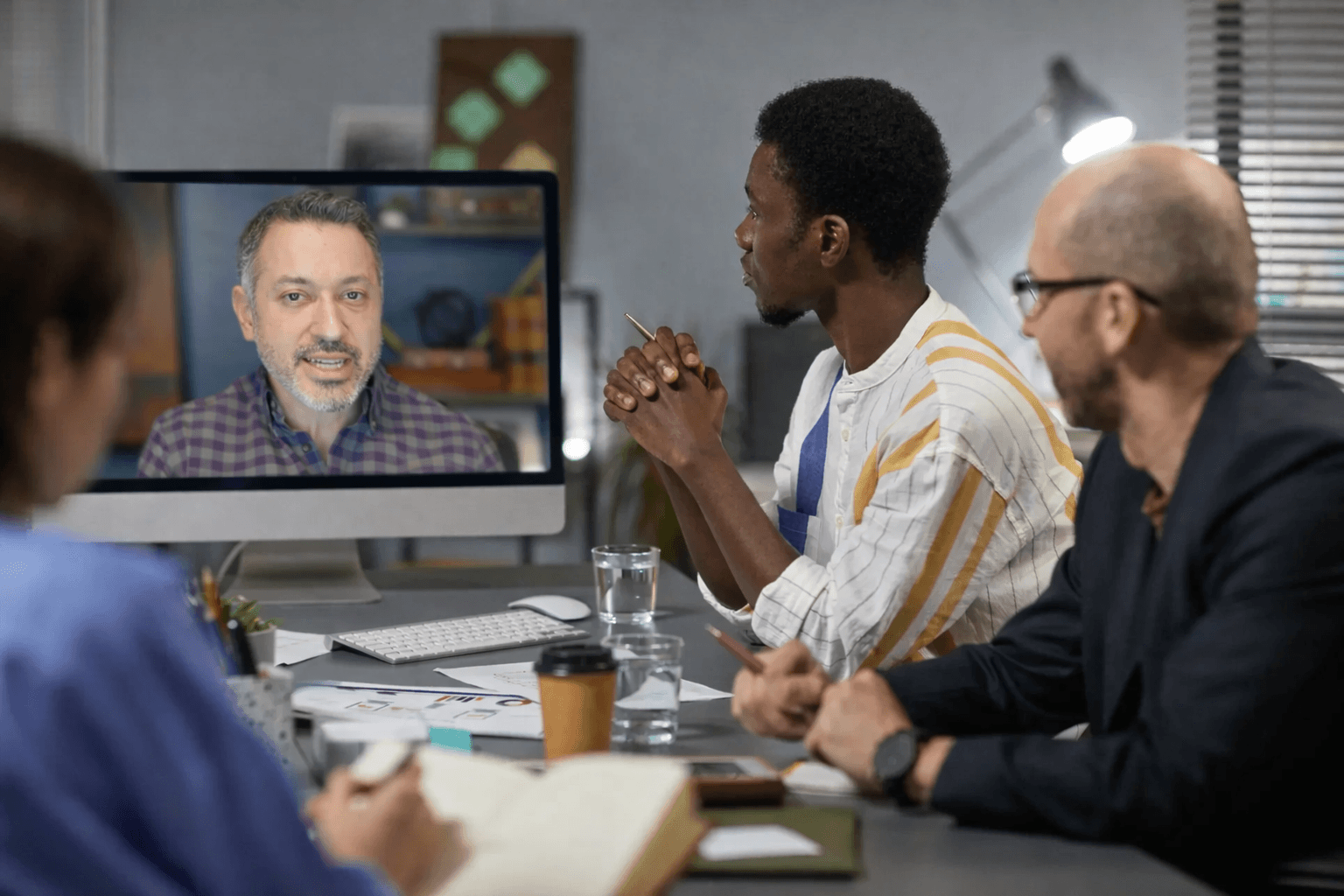 Ben leading a virtual AI check-in with a practice group